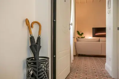 Letto o letti in una camera di Seggiole Boutique Apartment Iris