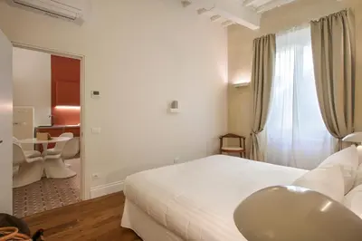 Letto o letti in una camera di Seggiole Boutique Apartment Iris