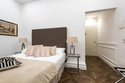 Letto o letti in una camera di RFC Repubblica Florence Core B&B