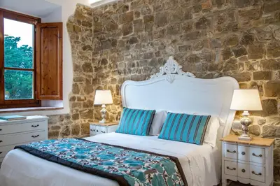 Letto o letti in una camera di Residenza le Colline del Paradiso