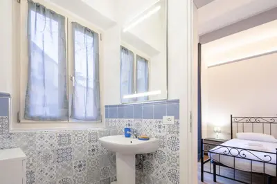 Letto o letti in una camera di Petrarca Apartment