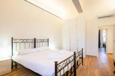 Letto o letti in una camera di Petrarca Apartment