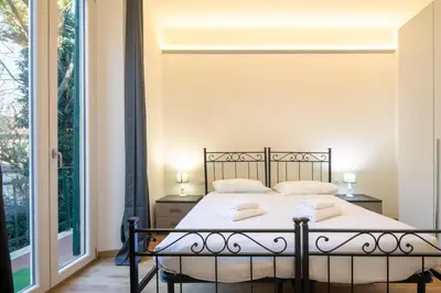 Letto o letti in una camera di Petrarca Apartment