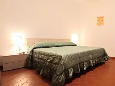Letto o letti in una camera di Casa Chianti