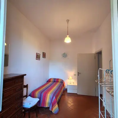 Letto o letti in una camera di Casa Chianti