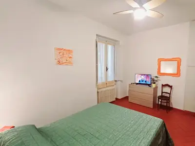 Letto o letti in una camera di Casa Chianti