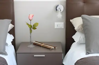 Letto o letti in una camera di PIUMABLU