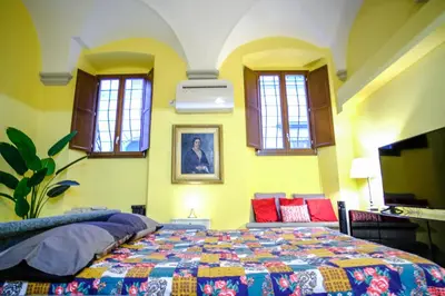 Letto o letti in una camera di Fiorenza Boutique Apartment