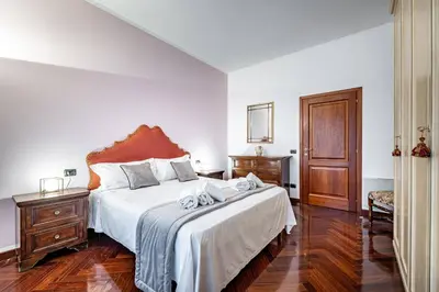 Letto o letti in una camera di YiD Elegant apt with garage