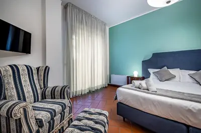 Letto o letti in una camera di YiD Elegant apt with garage