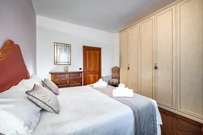 Letto o letti in una camera di YiD Elegant apt with garage