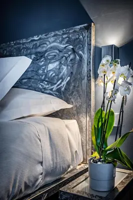 Letto o letti in una camera di Mama's Home Florence