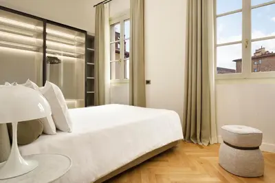 Letto o letti in una camera di Luxury Apartments by Palazzo Portinari Salviati
