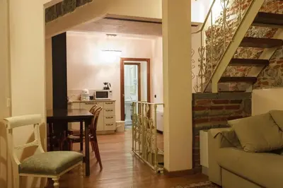 Area soggiorno di Cute Suite By Villa Il Mosaico