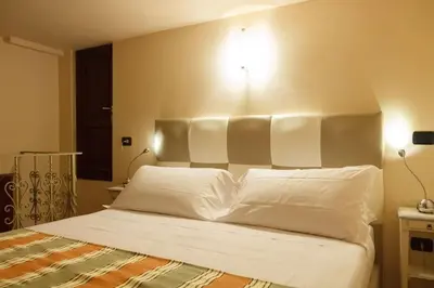 Letto o letti in una camera di Cute Suite By Villa Il Mosaico