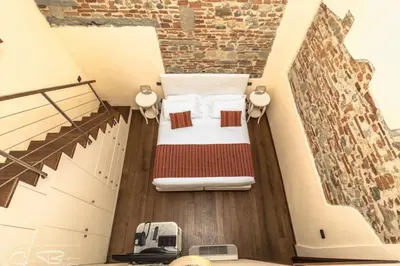 Letto o letti in una camera di Charming Suite By Villa Il Mosaico