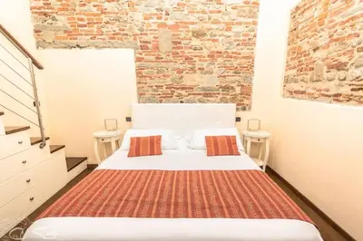Letto o letti in una camera di Charming Suite By Villa Il Mosaico