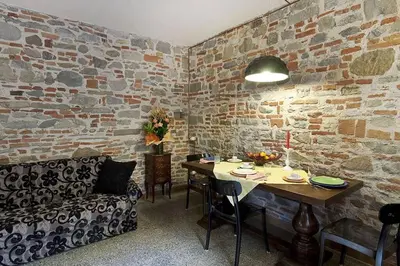 Area soggiorno di Cozy Suite By Villa Il Mosaico