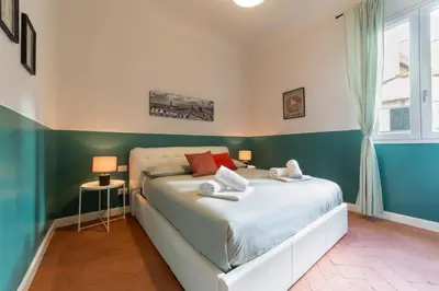 Letto o letti in una camera di A peaceful oasis by the city centre