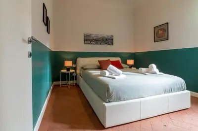 Letto o letti in una camera di A peaceful oasis by the city centre