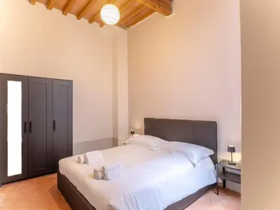 Letto o letti in una camera di [Centro] Sant’Ambrogio Flat