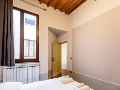 Letto o letti in una camera di [Centro] Sant’Ambrogio Flat