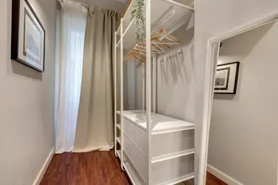 Letto o letti in una camera di Cloe Apartment by Mamo Florence