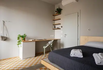 Letto o letti in una camera di 'RE-Dama Hostel