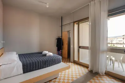 Letto o letti in una camera di 'RE-Dama Hostel