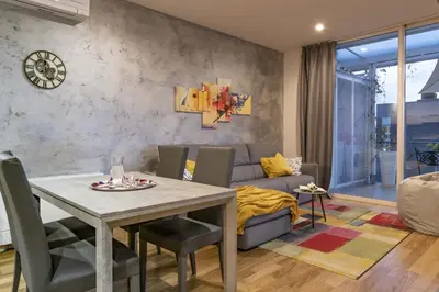 Area soggiorno di Italian Experience-Florence Suite Apartment