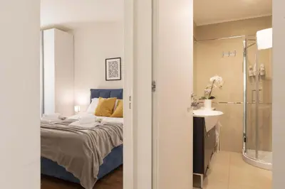 Letto o letti in una camera di Italian Experience-Florence Suite Apartment