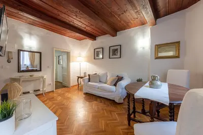 Area soggiorno di Signoria Florentine Apartment