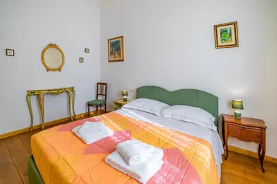 Letto o letti in una camera di GuestHost - Florence Quiet Apartment with Private Garden