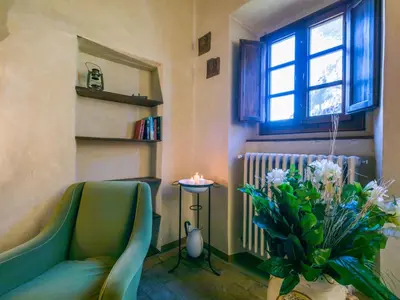 Area soggiorno di Apartment Il Convento by Interhome