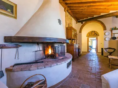 Area soggiorno di Apartment Il Convento by Interhome