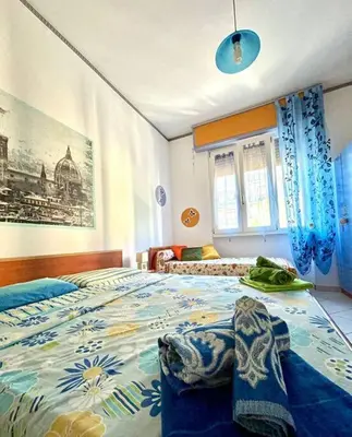 Letto o letti in una camera di Florence House Mariangela