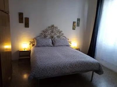 Letto o letti in una camera di L'OZioRinco