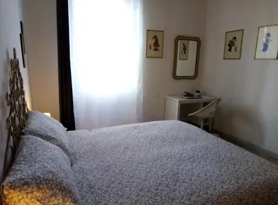 Letto o letti in una camera di L'OZioRinco