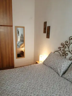 Letto o letti in una camera di L'OZioRinco