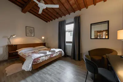 Letto o letti in una camera di San Giovanni House by Mmega