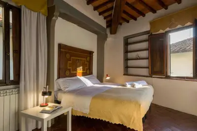 Letto o letti in una camera di Residenza dei Medici Palace Niccolò
