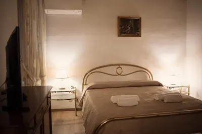Letto o letti in una camera di Da Mario in Florence Guesthouse