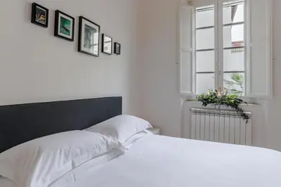 Letto o letti in una camera di Sophie's Flat Florence