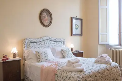 Letto o letti in una camera di Italian Experience-Duomo Suite