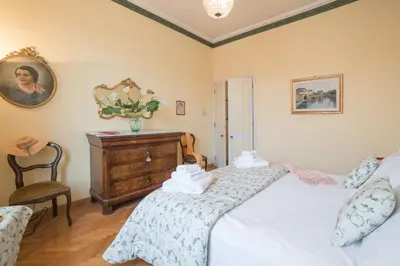 Letto o letti in una camera di Italian Experience-Duomo Suite