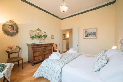 Letto o letti in una camera di Italian Experience-Duomo Suite