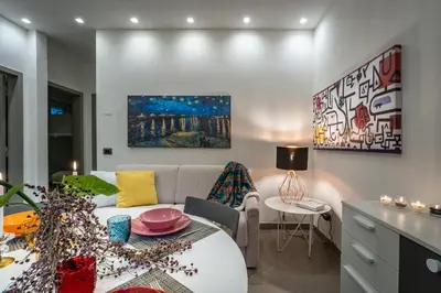 Area soggiorno di Garden apartment, il tuo accogliente rifugio a Firenze