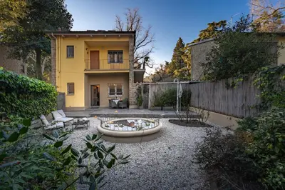 Giardino di Garden apartment, il tuo accogliente rifugio a Firenze
