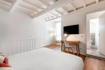Letto o letti in una camera di FLO Florence Loft