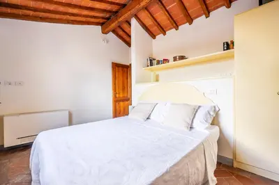 Letto o letti in una camera di Piazza Santa Croce